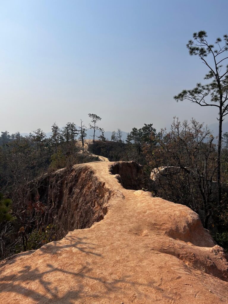 Pai Canyon (Kong Lan) – a captivating 3.6-mile loop trail offering stunning views of narrow ridges and steep drops, showcasing the region's unique geological beauty