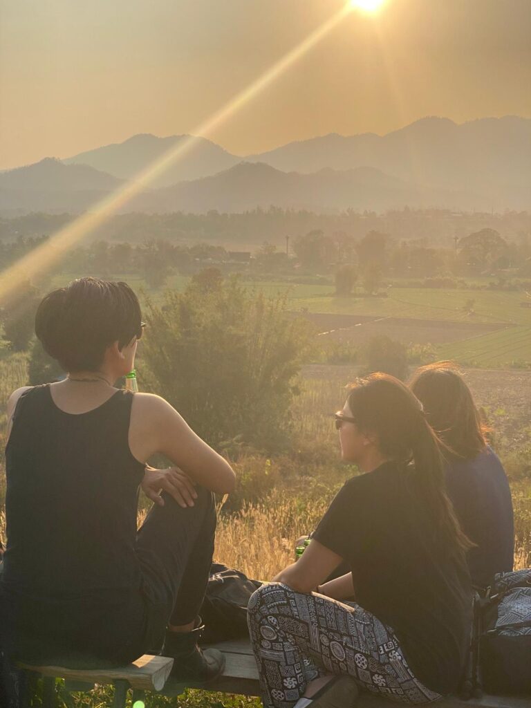 Sipping cold beer with friends at Two Huts, Pai, while watching the sunset paint the sky in stunning colors